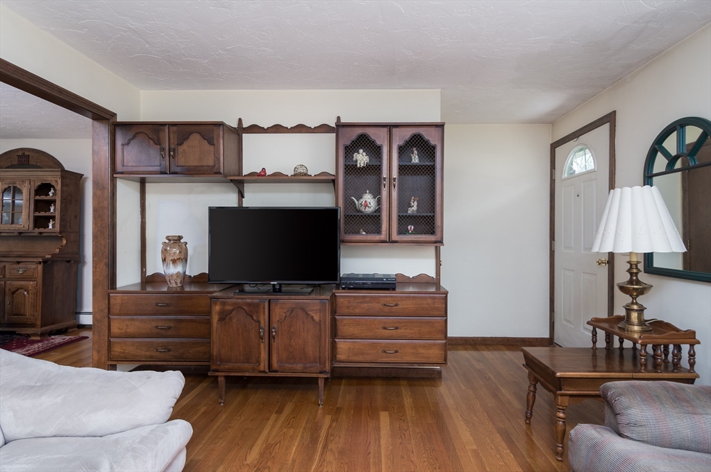 35 Juniper Lane Rutland, MA 01543 - Photo 7 of 15 a living room with furniture and a flat screen tv