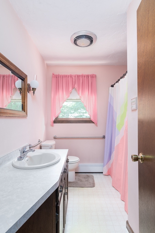 35 Juniper Lane Rutland, MA 01543 - Photo 8 of 15 a bathroom with a sink a vanity and a mirror