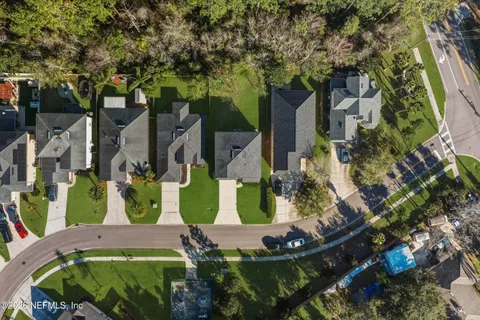 a view of swimming pool with outdoor seating