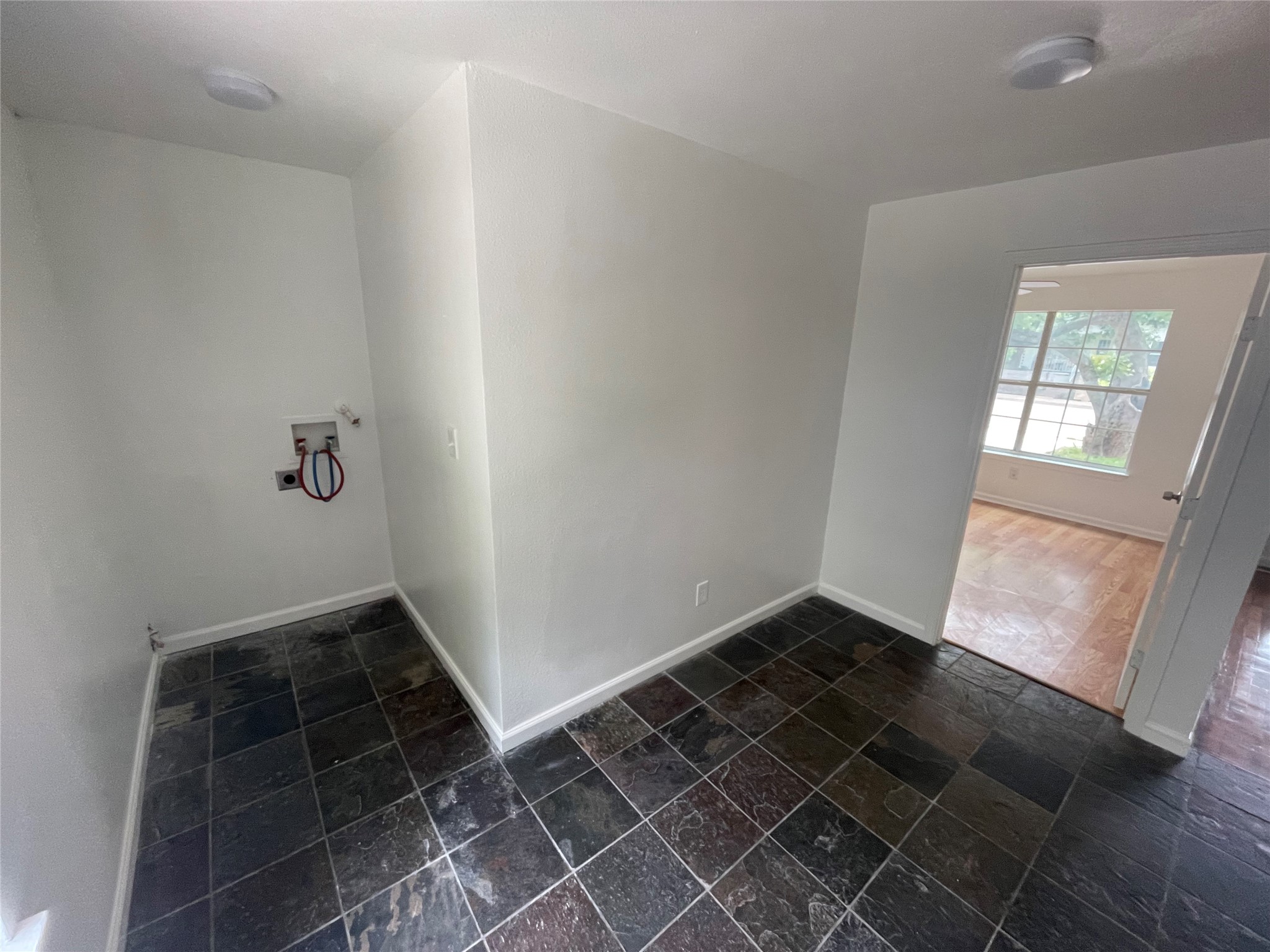 2808 Lyons Road, Unit A Austin, TX 78702 - Photo 7 of 12 a view of an empty room and window