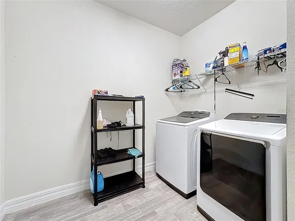 a storage room with washer and dryer