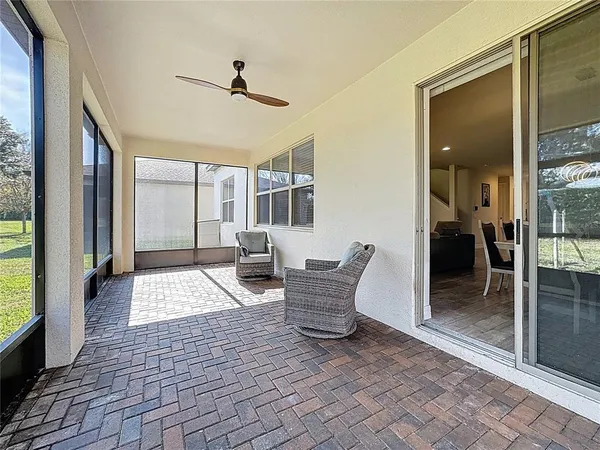 a view of living room filled with furniture