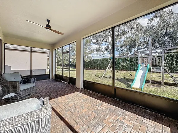 a living room with large windows