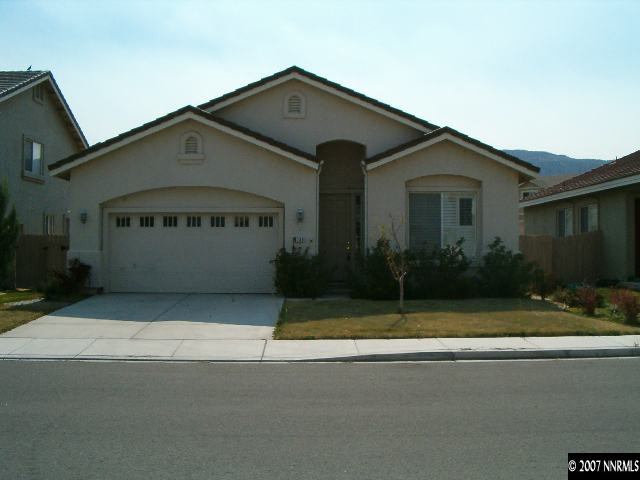 2180 Evergreen Reno, NV 89521 - Photo 1 of 9 a view of front of house with a yard