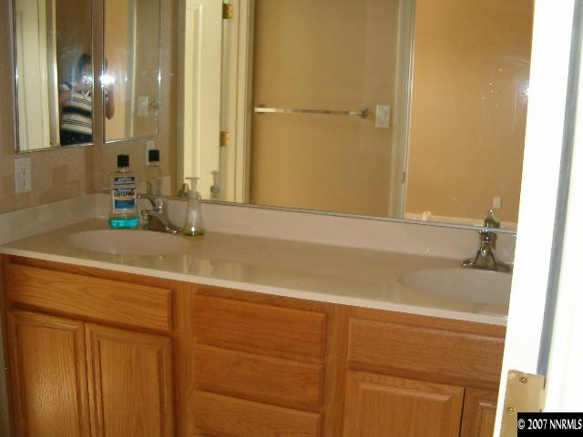 2180 Evergreen Reno, NV 89521 - Photo 5 of 9 a bathroom with a sink and a mirror