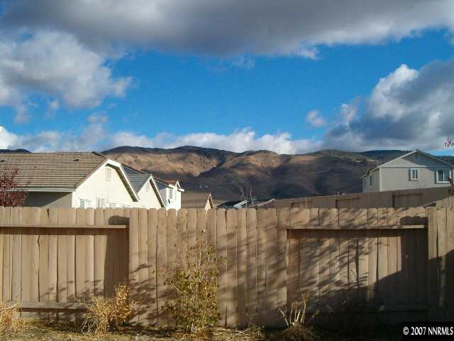 2180 Evergreen Reno, NV 89521 - Photo 8 of 9 a view of house with backyard