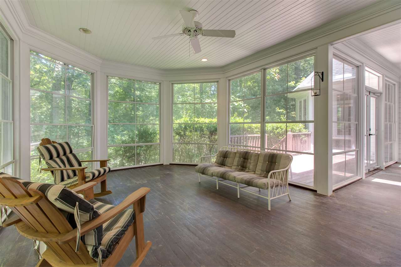 10 Pearse Wynd Road Bahama, NC 27503 - Photo 16 of 29 a living room with furniture and floor to ceiling windows