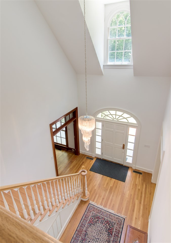 10 Pearse Wynd Road Bahama, NC 27503 - Photo 20 of 29 a view of a hallway with windows