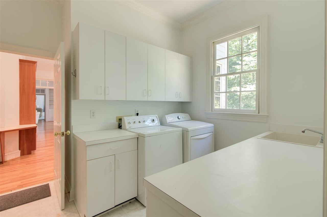 10 Pearse Wynd Road Bahama, NC 27503 - Photo 26 of 29 a utility room with dryer and washer