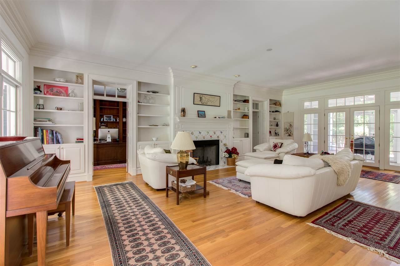 10 Pearse Wynd Road Bahama, NC 27503 - Photo 29 of 29 a living room with furniture and a fireplace