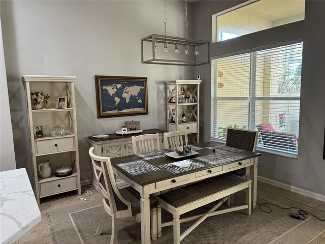 a view of a livingroom with furniture and window