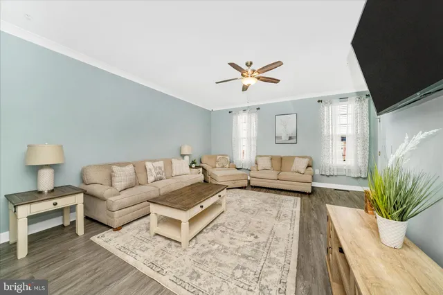 a living room with furniture and a couch