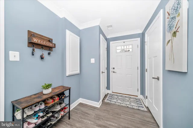 a room with furniture and a wooden floor