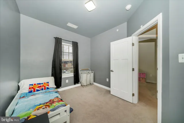 a children room with toys and closet