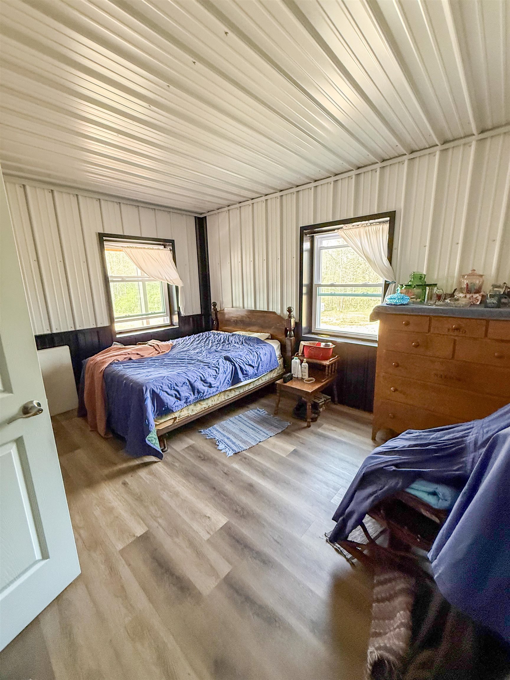 625 Atchison Road Springville, TN 38256 - Photo 19 of 40 a bedroom with two beds and a window