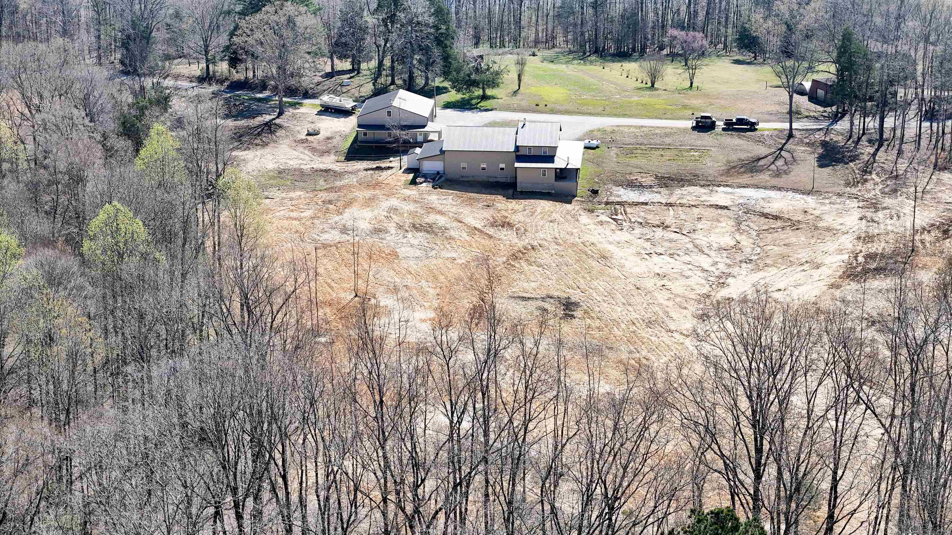 625 Atchison Road Springville, TN 38256 - Photo 38 of 40 a view of backyard with swimming pool and seating space
