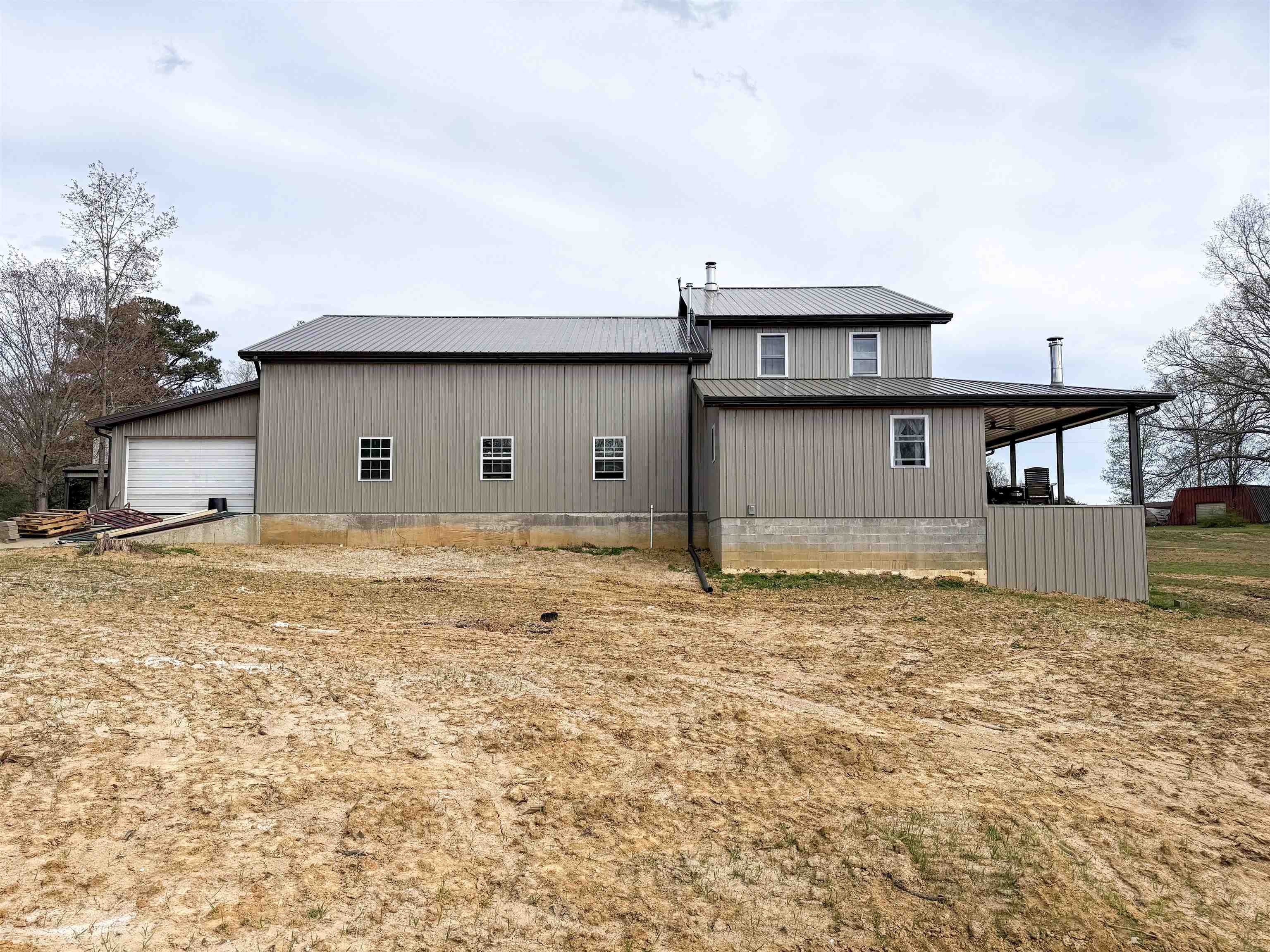 625 Atchison Road Springville, TN 38256 - Photo 5 of 40 a front view of a house with a yard