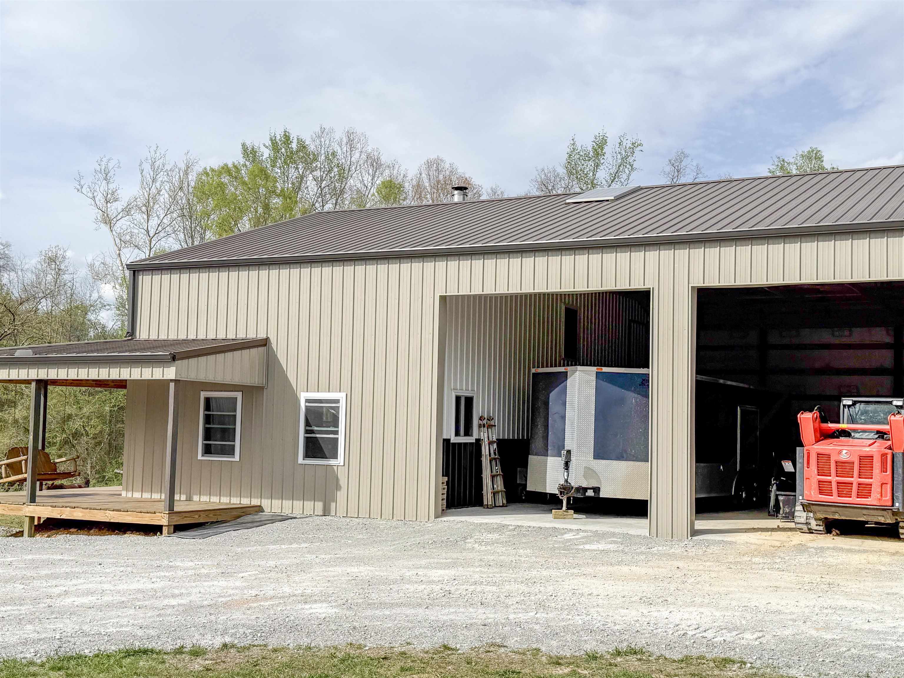 625 Atchison Road Springville, TN 38256 - Photo 6 of 40 an outdoor view of house with garage