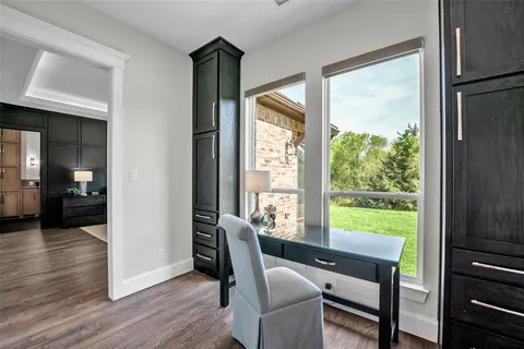 a kitchen with sink cabinets and refrigerator