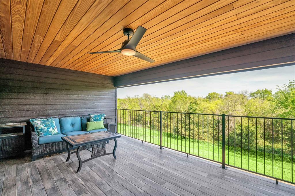 2286 White Stag Road Celina, TX 75009 - Photo 26 of 35 Enjoy the covered patio off the upstairs entertainment room.