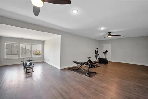 a kitchen with a table and chairs