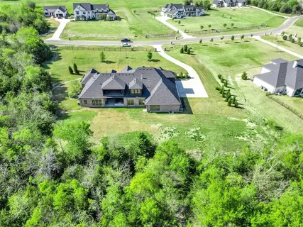 a view of houses with yard