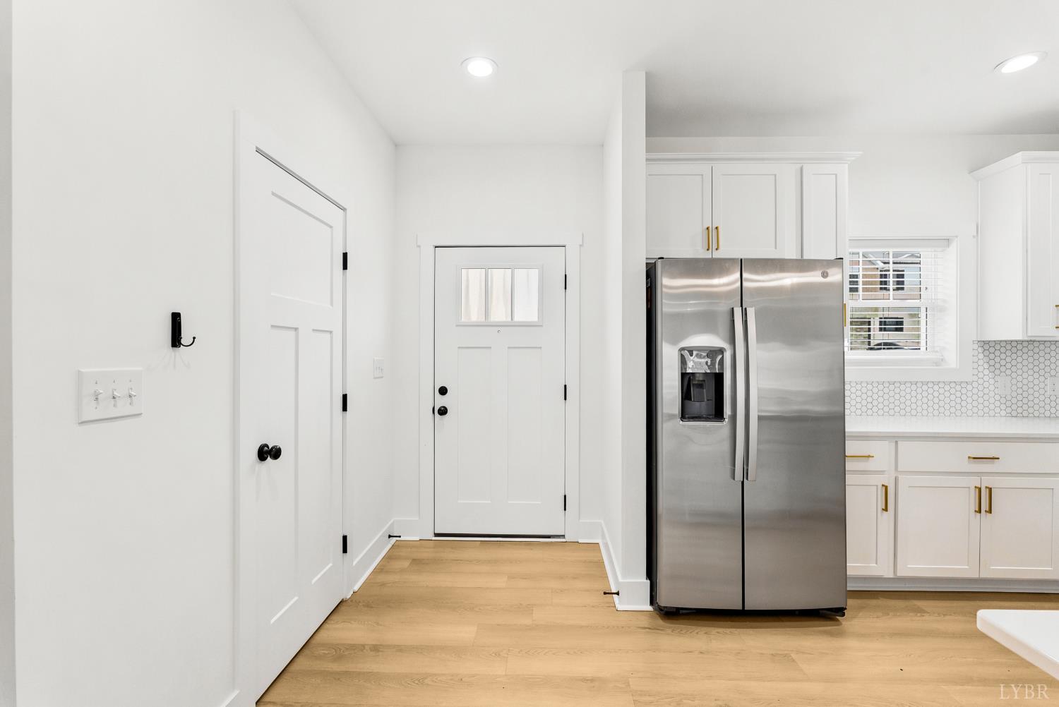 556 Leesville Road, Unit 406 Lynchburg, VA 24502 - Photo 3 of 39 a metallic refrigerator freezer sitting in a kitchen