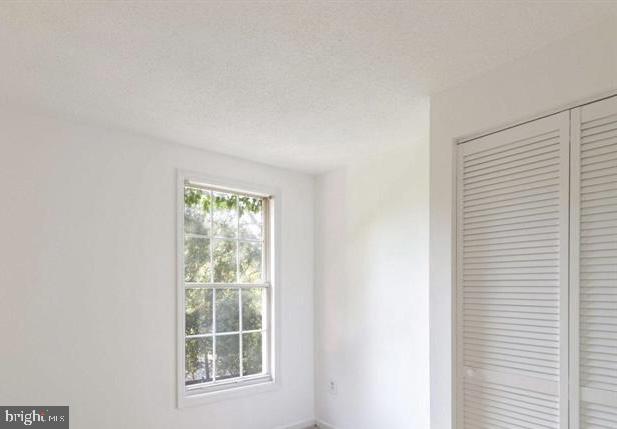 1711 Jacobs Meadow Drive Severn, MD 21144 - Photo 11 of 16 a view of an empty room with a window