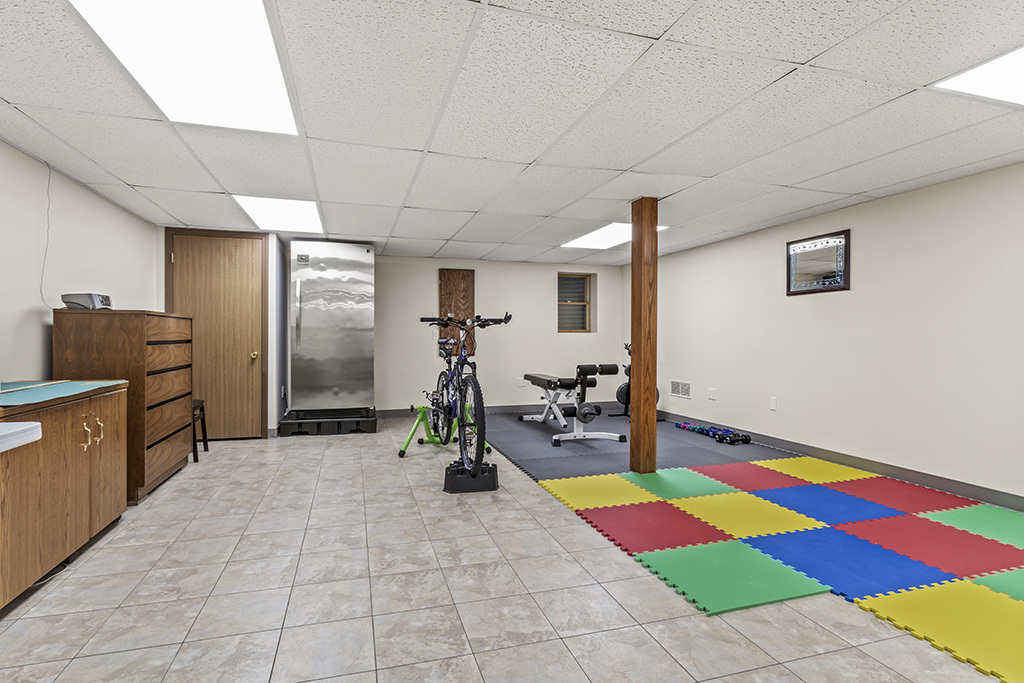 1011 Ranchwood Drive Shorewood, IL 60404 - Photo 14 of 18 a very nice looking room with many windows