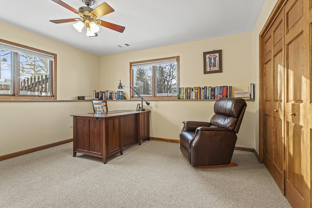 1011 Ranchwood Drive Shorewood, IL 60404 - Photo 8 of 18 a living room with furniture and a window