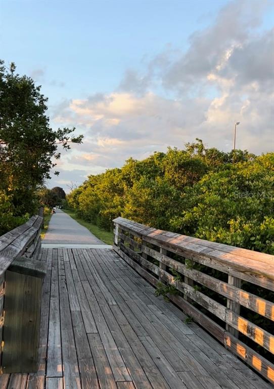 8325 Matecumbe Road Port Charlotte, FL 33981 - Photo 5 of 7 a view of outdoor space with wooden floor and fence