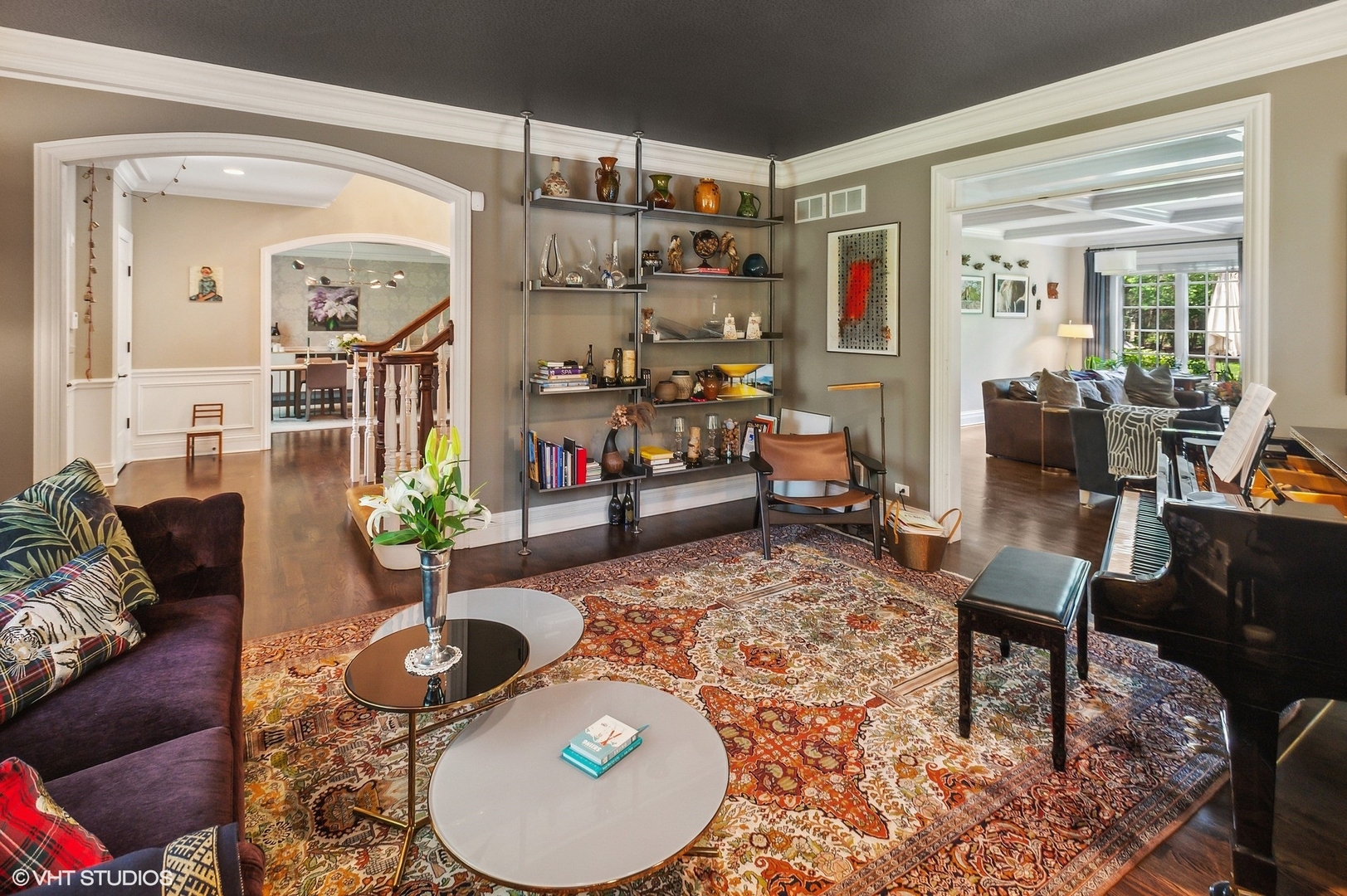 733 York Road Glenview, IL 60025 - Photo 3 of 21 a living room with furniture and a chandelier