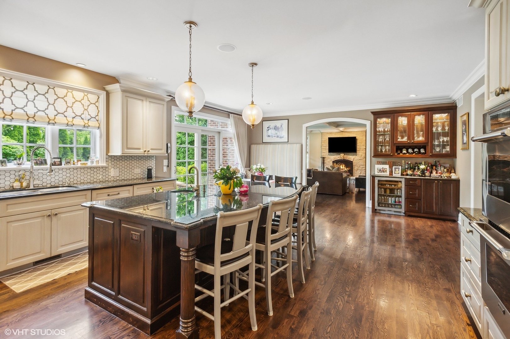 733 York Road Glenview, IL 60025 - Photo 7 of 21 a kitchen with stainless steel appliances granite countertop a stove and a wooden floors