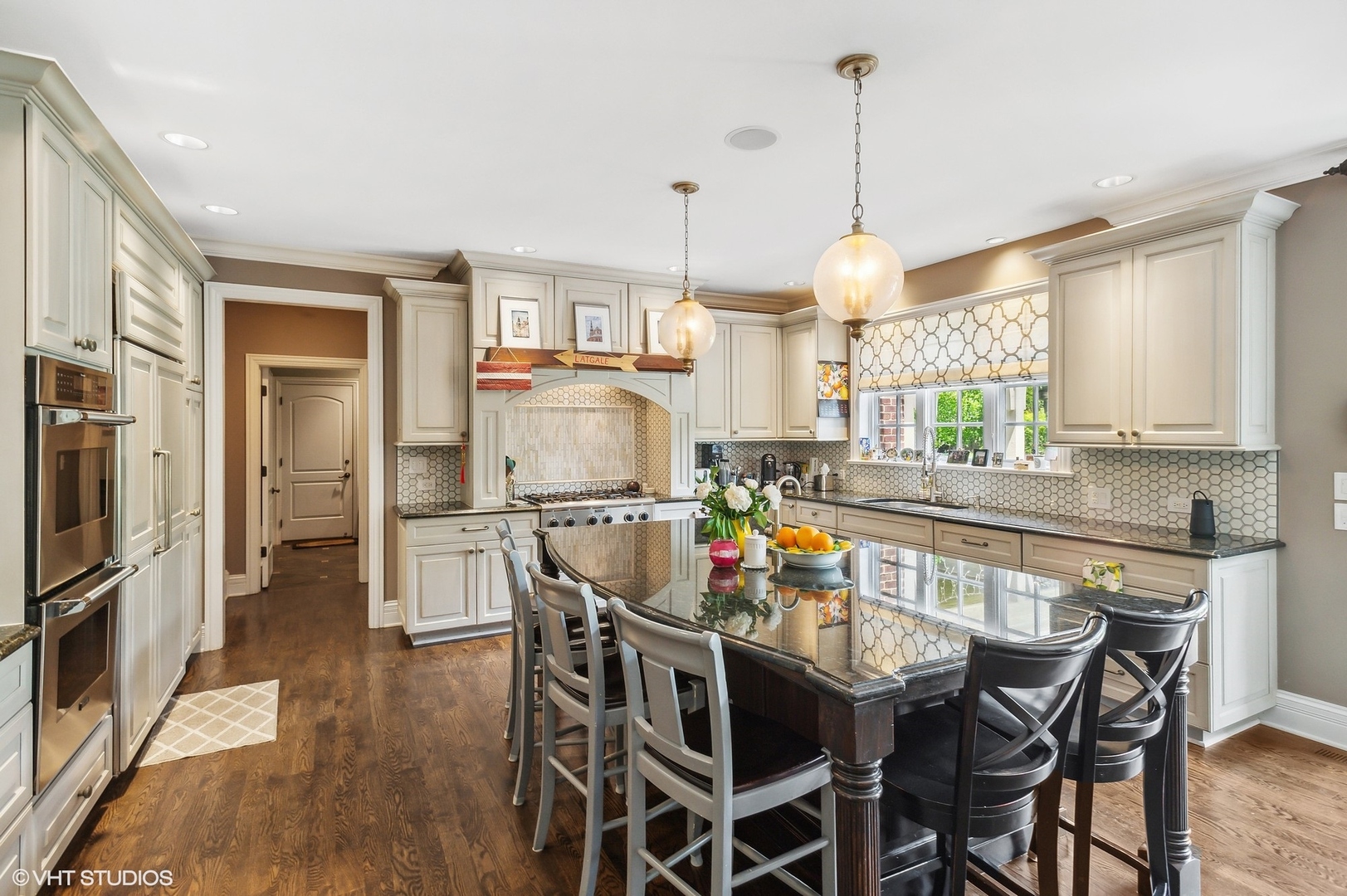 733 York Road Glenview, IL 60025 - Photo 9 of 21 a dining room filled chandelier and wooden floor