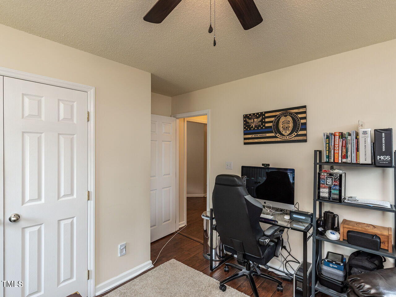 1955 Ranch Road Clayton, NC 27520 - Photo 23 of 28 a view of a livingroom with furniture and a flat screen tv