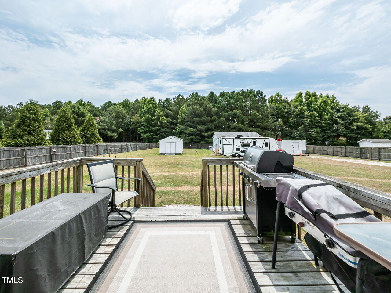1955 Ranch Road Clayton, NC 27520 - Photo 24 of 28 a view of roof deck with furniture