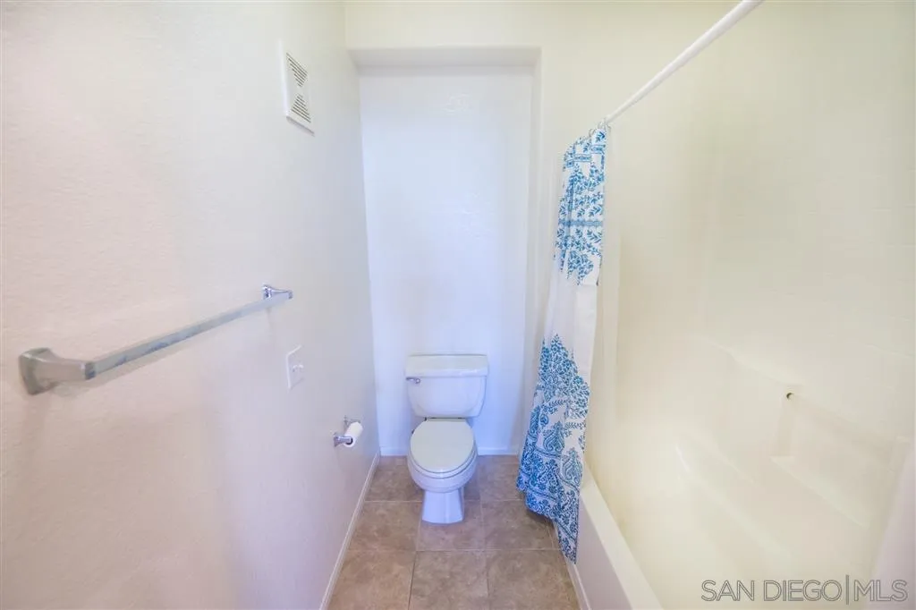3267 Dehesa Road, Unit 65 El Cajon, CA 92019 - Photo 20 of 25 a bathroom with a toilet and a shower