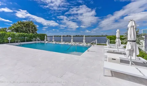 a view of a patio with swimming pool