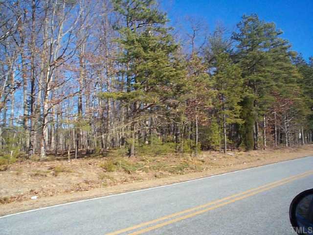 0 Landmark North, Unit 97 Roxboro, NC 27574 - Photo 1 of 2 a view of a yard with large trees
