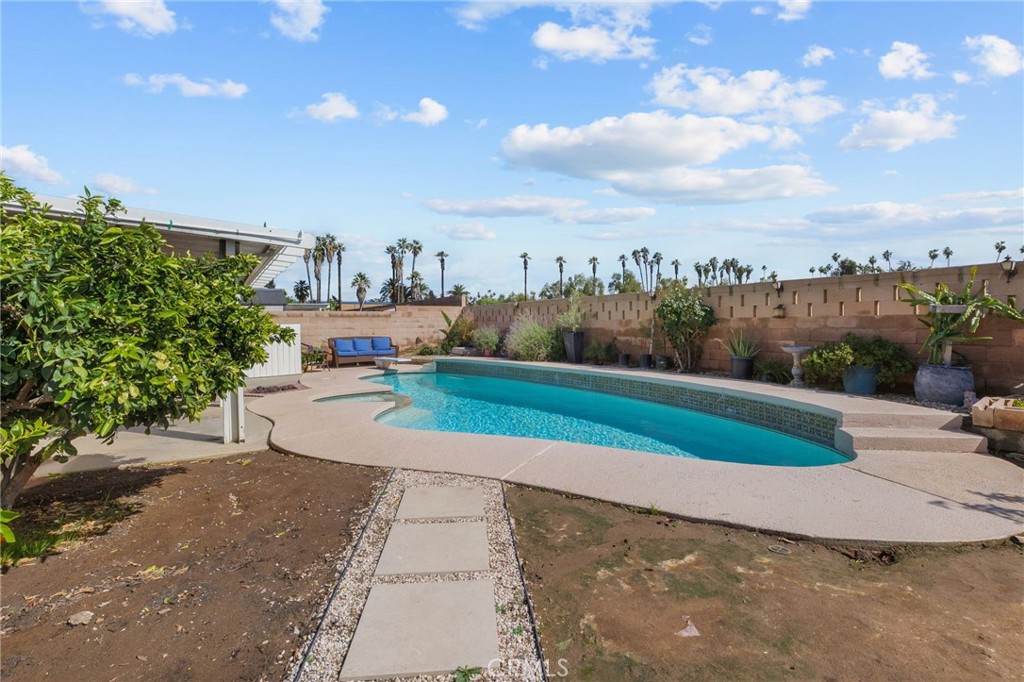 8548 Turlock Drive Riverside, CA 92504 - Photo 42 of 56 a view of a street with a houses