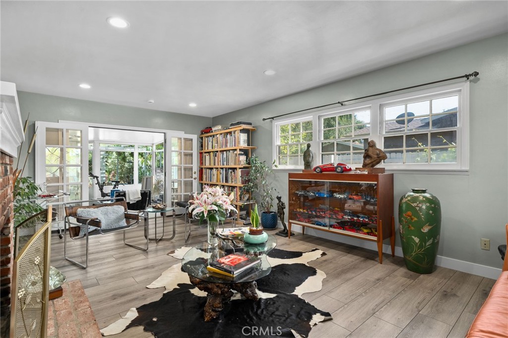5180 Stonewood Drive Riverside, CA 92506 - Photo 12 of 49 a living room with furniture and a fireplace