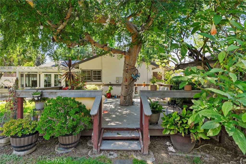 5180 Stonewood Drive Riverside, CA 92506 - Photo 40 of 49 a view of a house with balcony and plants