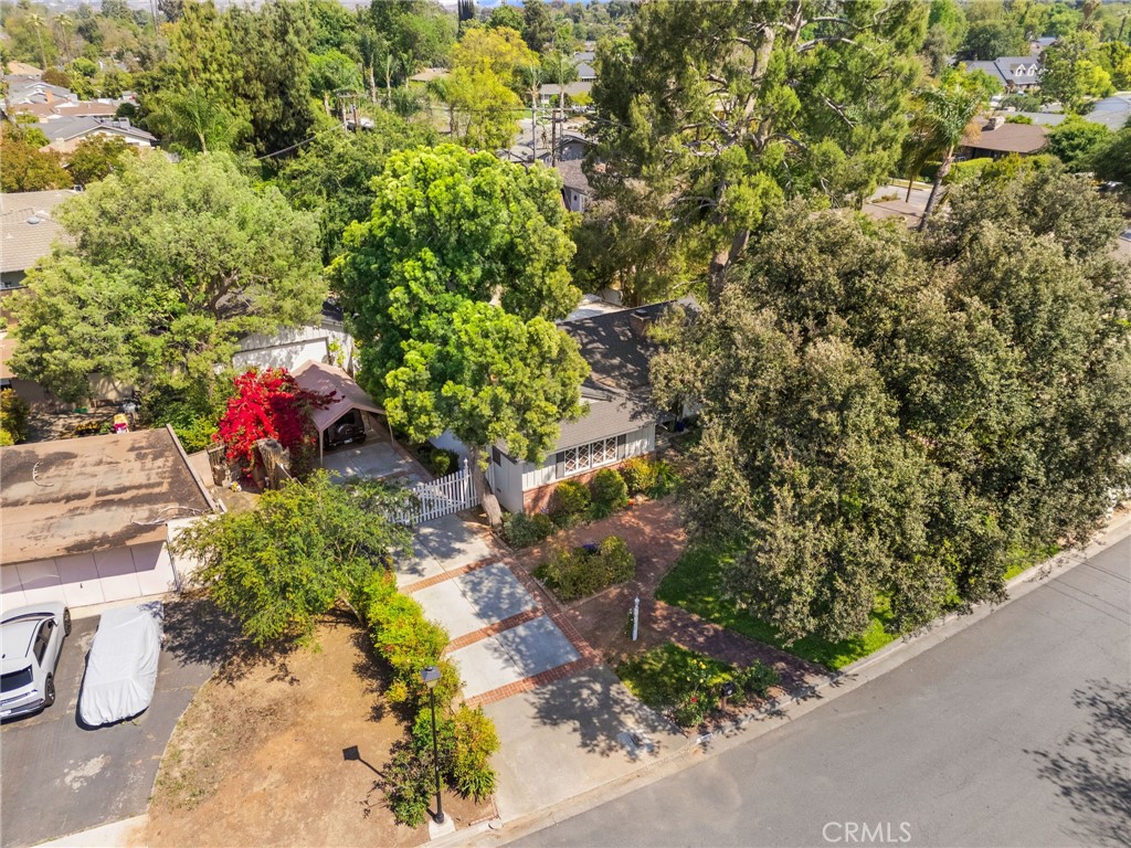 5180 Stonewood Drive Riverside, CA 92506 - Photo 42 of 49 a backyard of a house with lots of green space