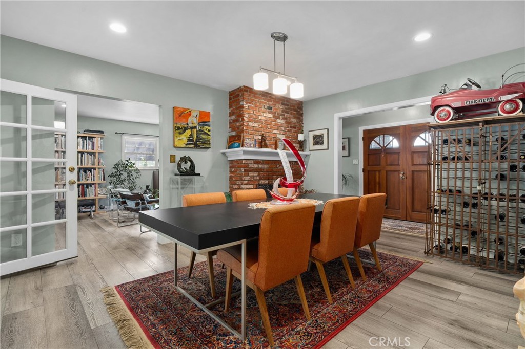 5180 Stonewood Drive Riverside, CA 92506 - Photo 9 of 49 a view of a dining room with furniture and wooden floor