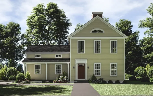 front view of a house with a yard
