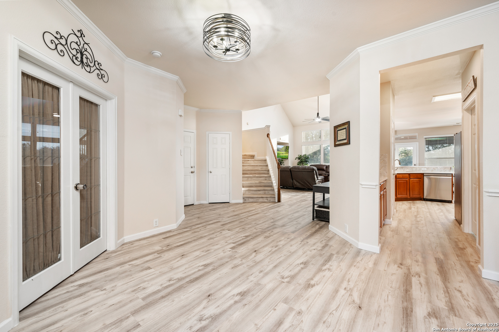10414 Rainbow View Helotes, TX 78023 - Photo 6 of 38 a view of a hallway view with wooden floor and seating space