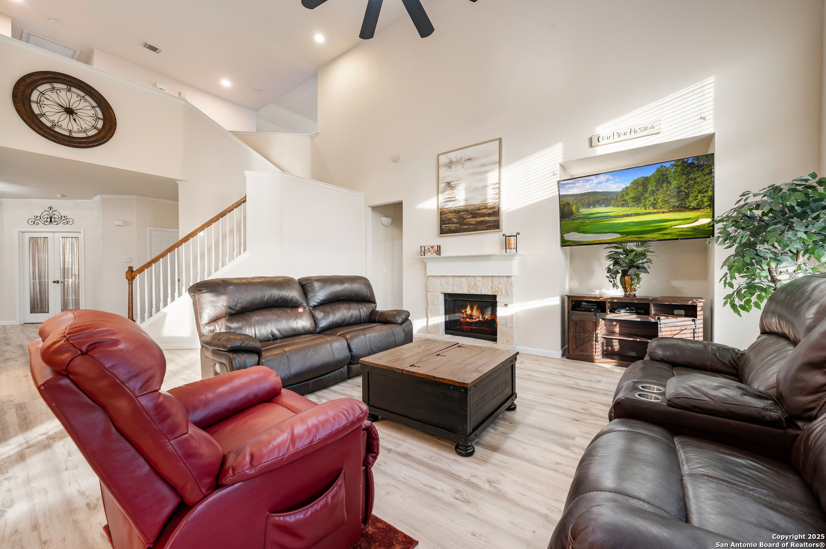 10414 Rainbow View Helotes, TX 78023 - Photo 10 of 38 a living room with furniture fireplace and a large window