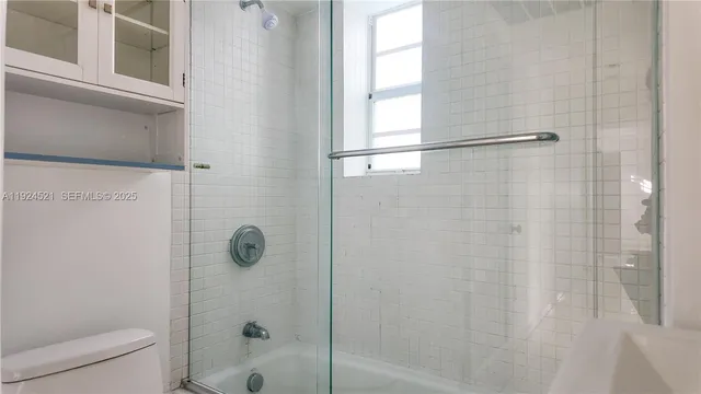 a view of empty room with windows