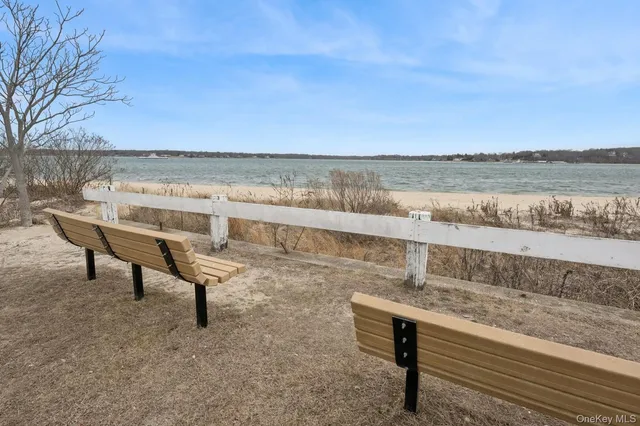 a view of a terrace with outdoor seating and trees