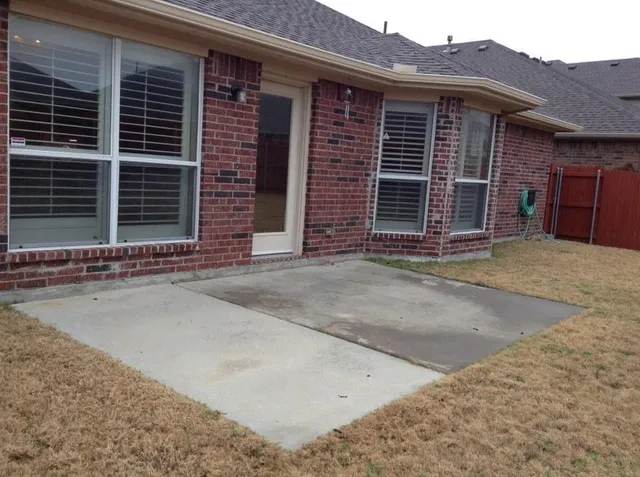 a front view of a house with a garage